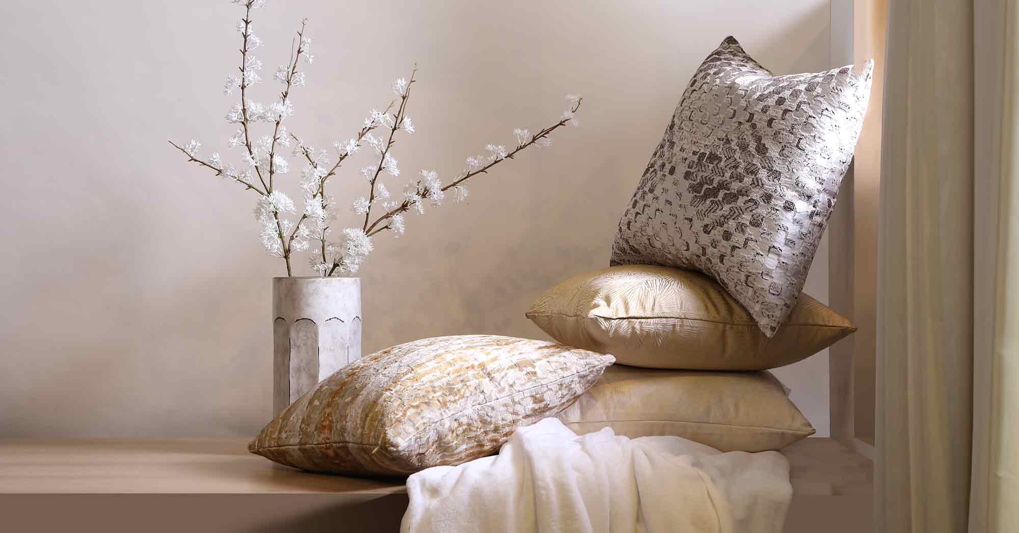 Beyond Fabric: The Transformative Power of Curtains & Cushions